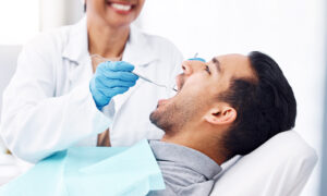 dentist with dental implants patients.