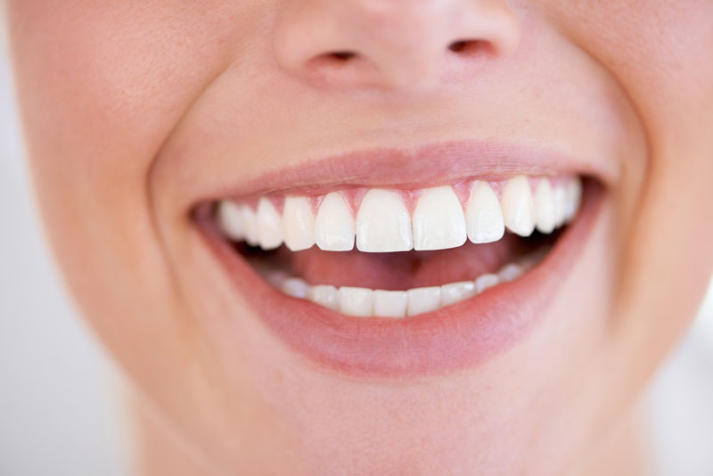 Smile, dental and closeup of woman teeth with health, wellness, and morning oral hygiene routine. Self-care, happy and zoom of young female person with mouth for clean, fresh or dentistry treatment.